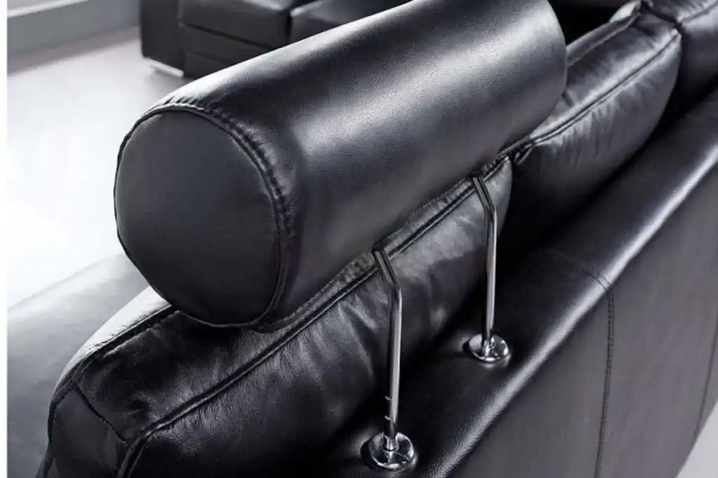 Designerski narożnik enzo ze skóry naturalnej z funkcją spanie, regulowanymi zagłówkami oraz pufami